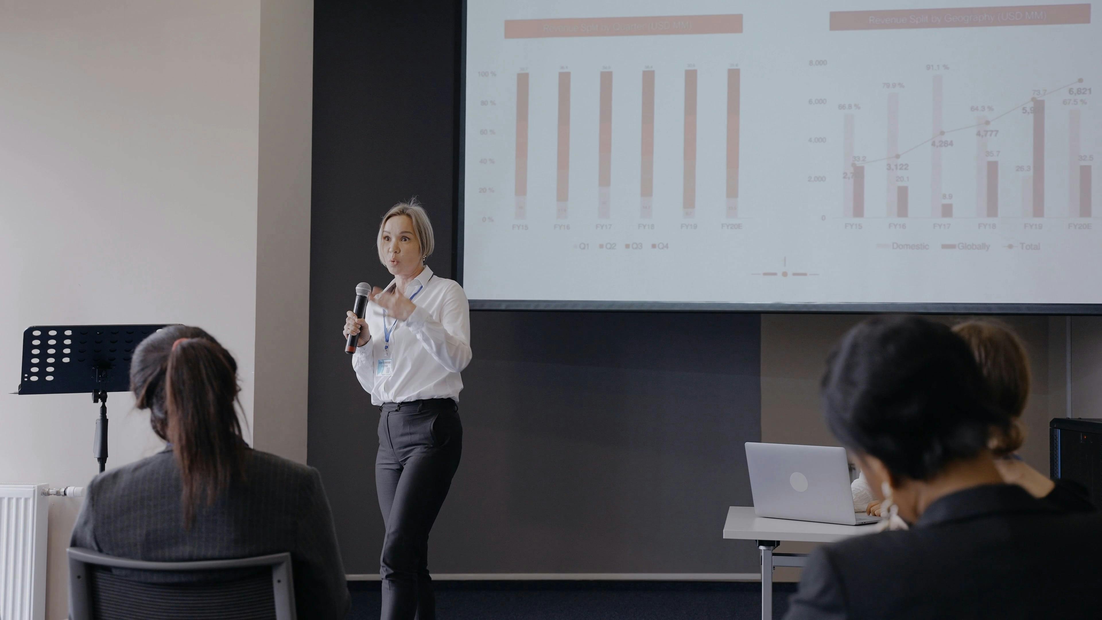 Woman Presenting at a Conference · Free Stock Video