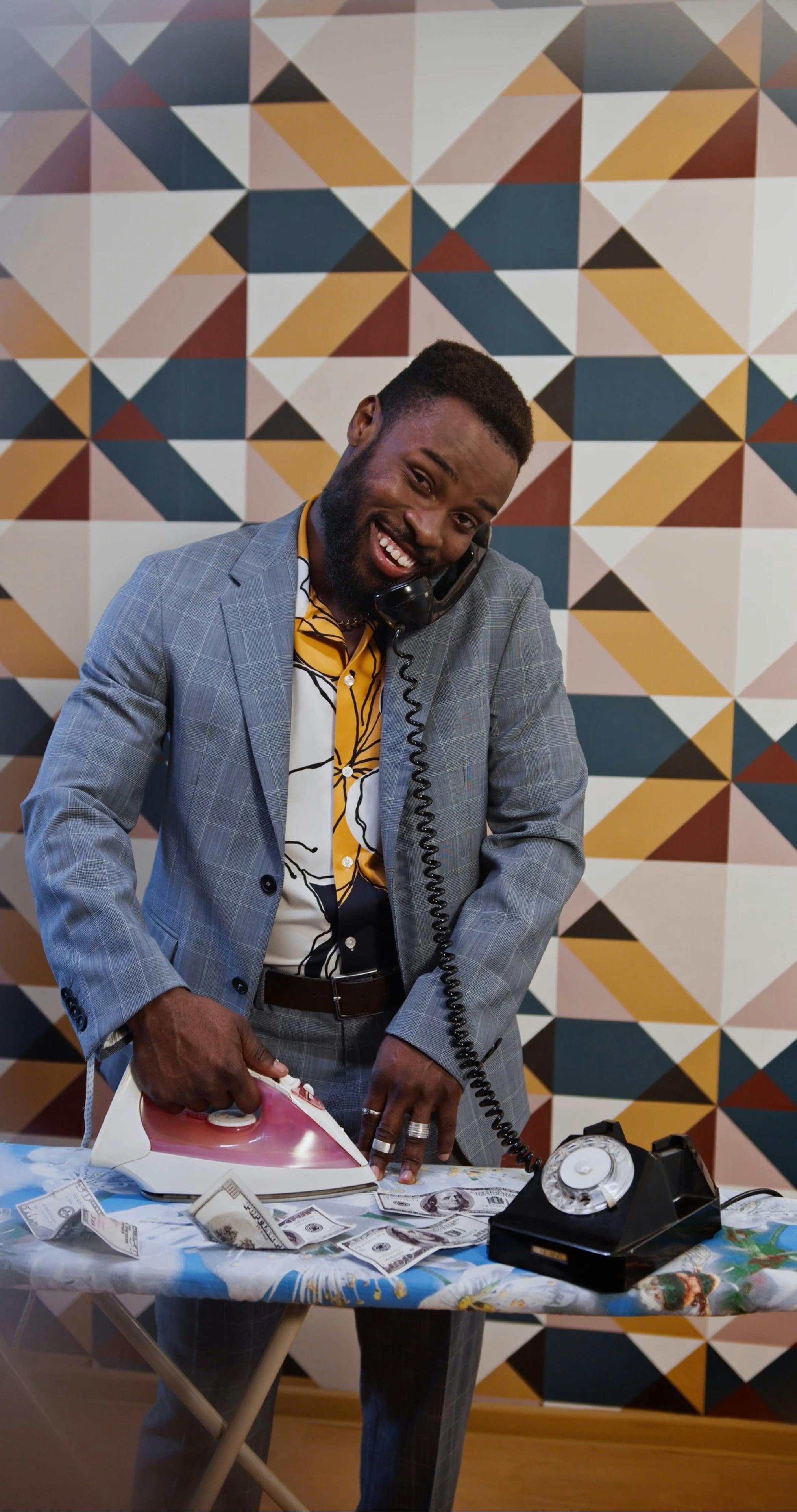 A Man Flat Ironing Dollar Bills Free Stock Video Footage, RoyaltyFree