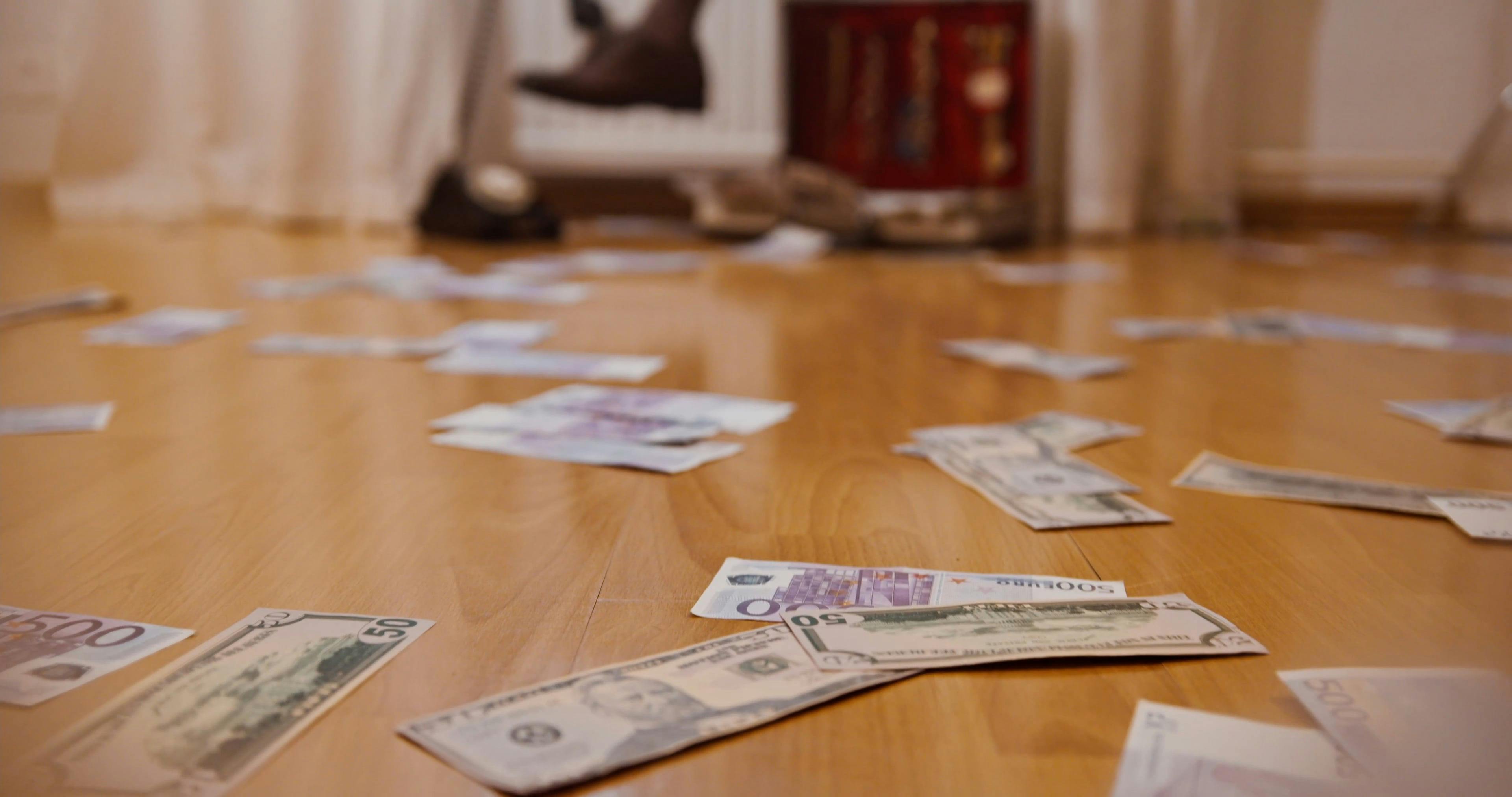 A Man's Money Scattered on the Floor · Free Stock Video
