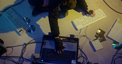 A Hacker Typing on Multiple Keyboards