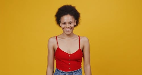 Woman with Afro Hair Being Happy