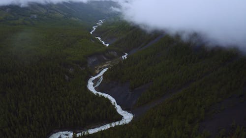 Aerial Footage of Clouds Over Mountains