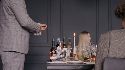 Sommelier Pouring the Wine in a Glass