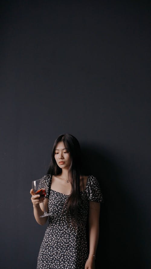 Woman Swirling Wine