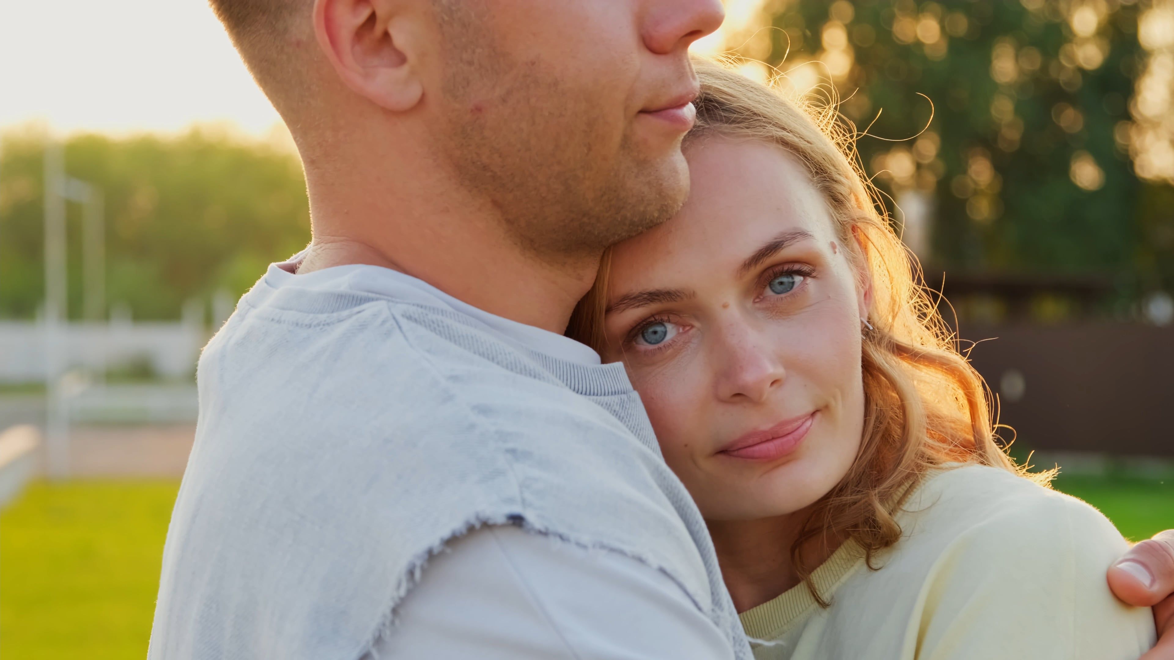 A Romantic Couple Hugging Outdoors at Sunset Free Stock Video Footage ...