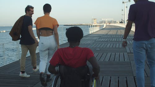 Friends Hanging Out in the Boardwalk