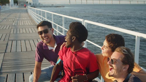 Friends Having Fun in the Harbor Boardwalk