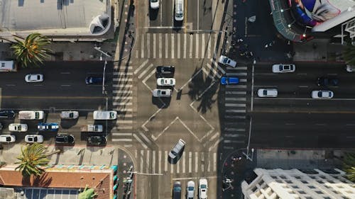 Vehicles at an Intersection Road in a City