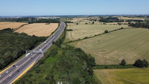 Vehicles Passing on a Countryside Road