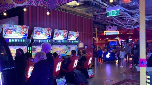 People Playing in Amusement Arcade