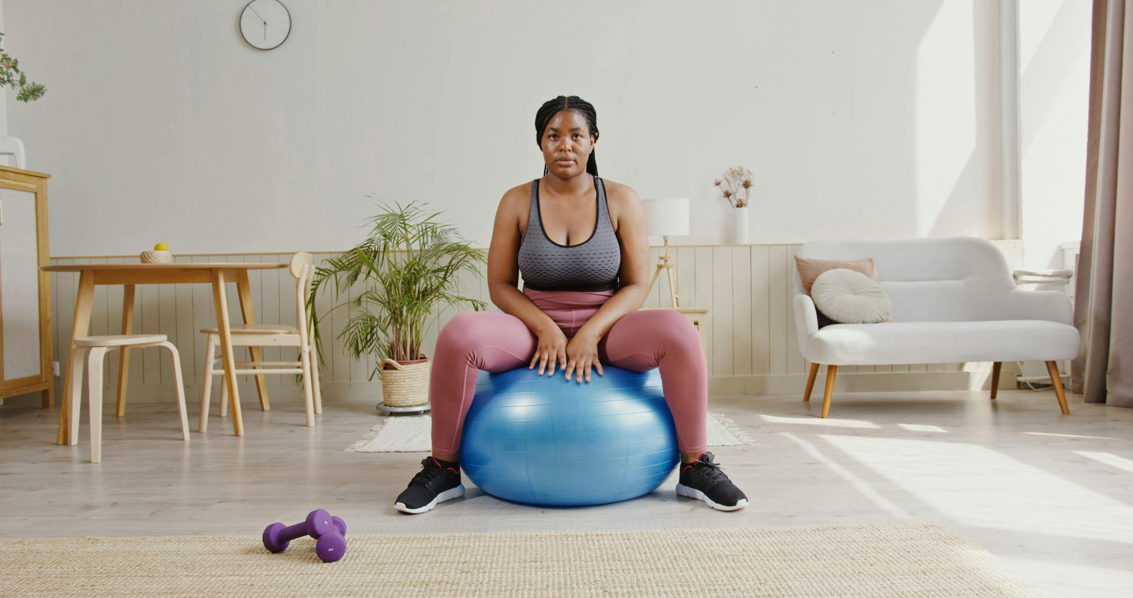 Woman Sitting on Exercise Ball · Free Stock Video