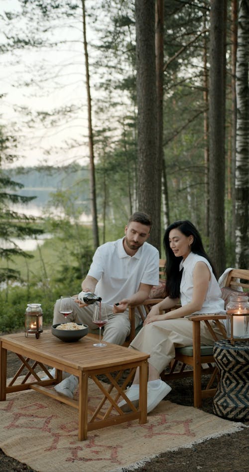 A Couple Having a Date in the Forest