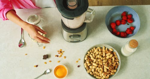 A Person Making a Healthy Smoothie