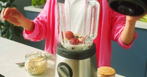 Close Up Video of a Person Making a Smoothie