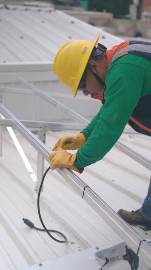 A Man Working on the Roof