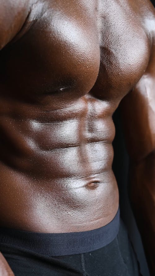 Close up of the Upper Body of a Muscular Man