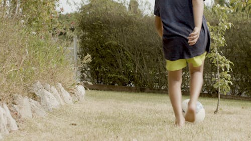 Kid Playing with a Soccer Ball