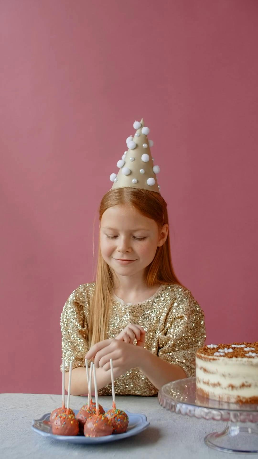A Little Girl Eating a Cake Pop · Free Stock Video