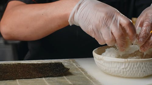 Person Holding a Rice