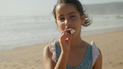 Girl Enjoying Eating Ice Cream