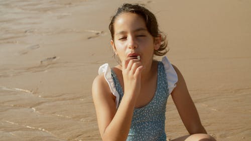 Girl Enjoying Eating Ice Cream