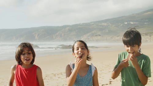 Kids Eating Ice Cream on the Beach