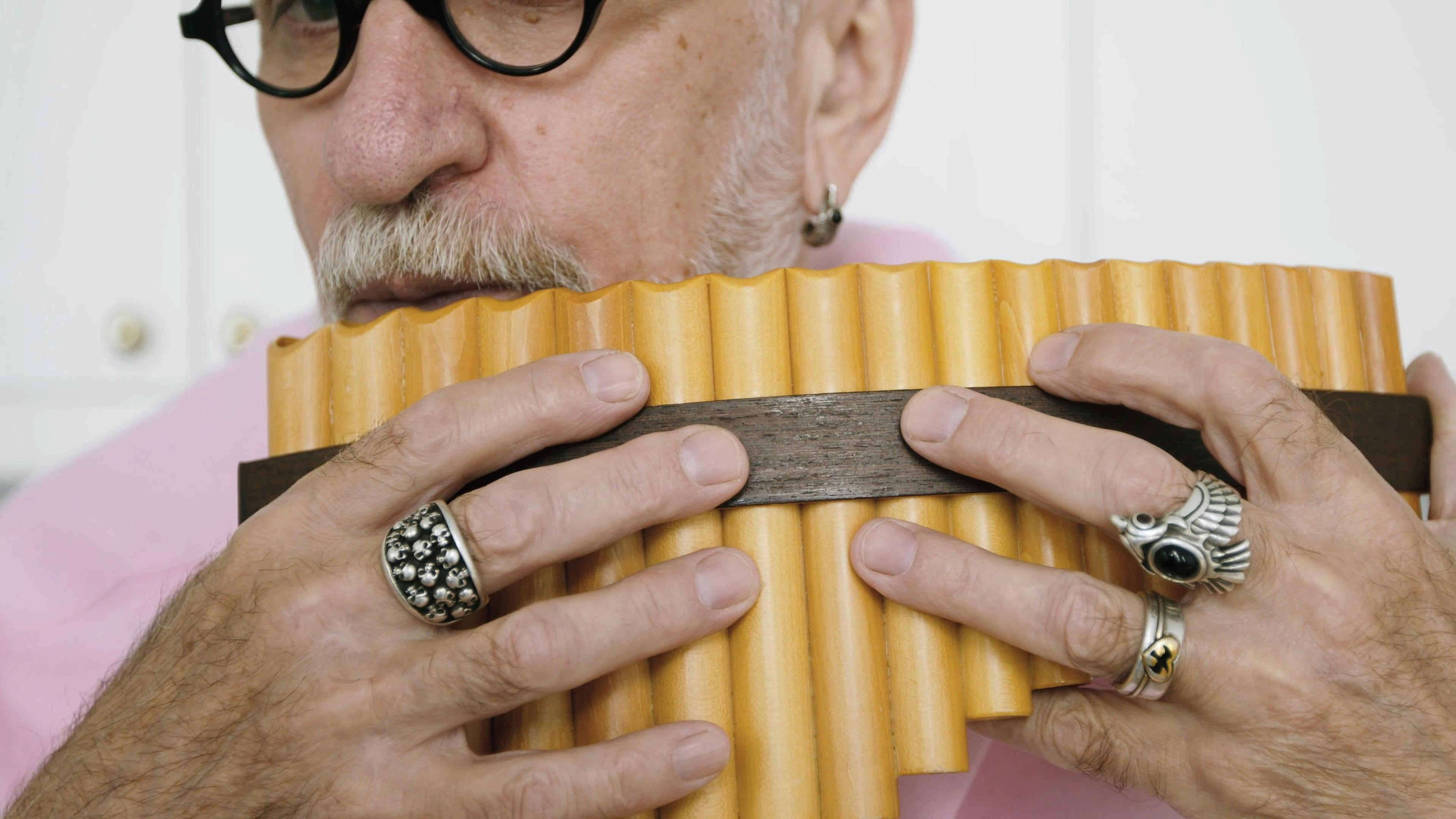 A Musician using a Panpipe Free Stock Video Footage, RoyaltyFree 4K & HD Video Clip