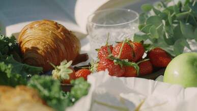 close up video of a person getting a strawberry