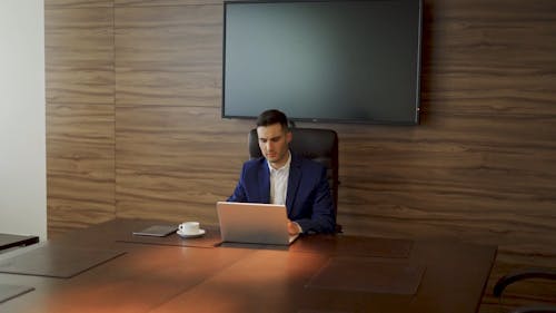 Businessman Working Using Laptop