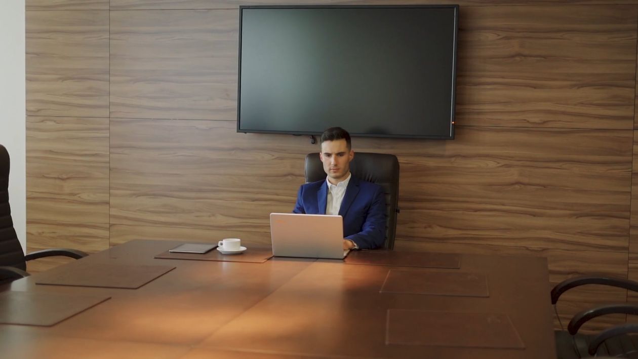 A Man Sitting while Using His Laptop Free Stock Video Footage, Royalty ...