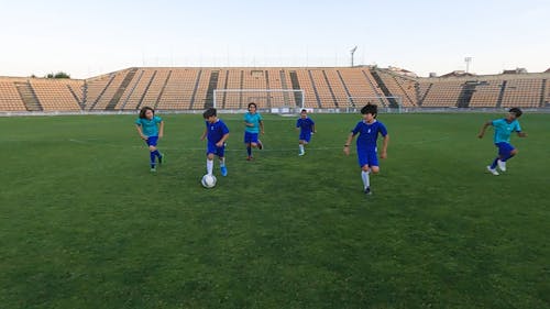 Children Having Fun Playing Soccer