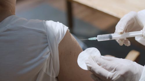 Close Up Video of a Person Getting Vaccinated