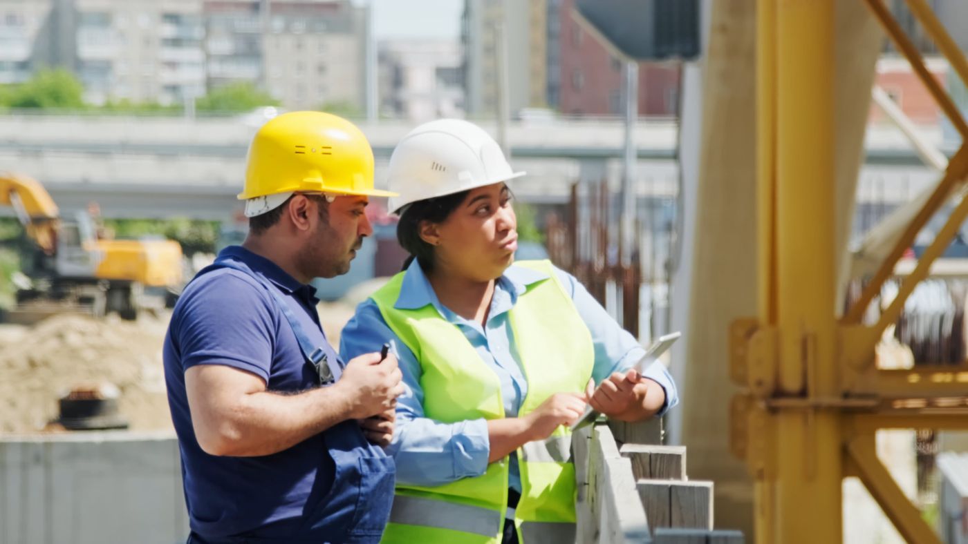 Engineers reviewing drawings on site