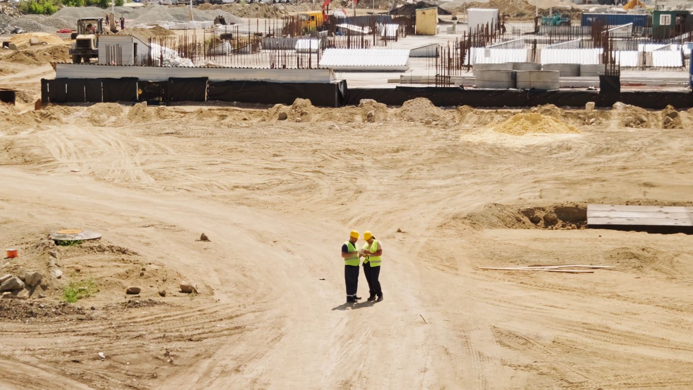 Site team walking a project under construction