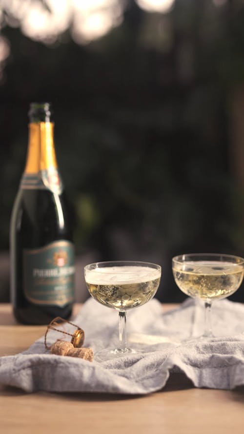 A Bottle of Champagne and Glasses