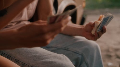 A Man and a Woman Playing Cards