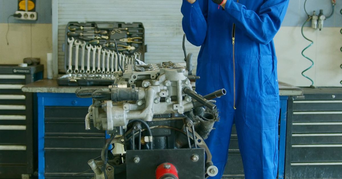 Engine Inspecttion A Man Inspecting a Car Engine Free Stock Video Footage, Royalty-Free 4K ...