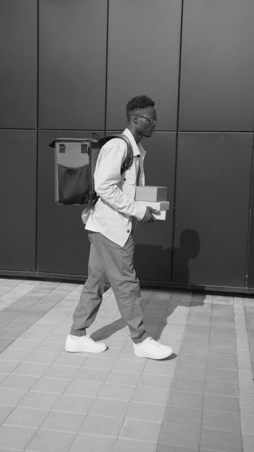 Man Carrying Thermal Bag Walking