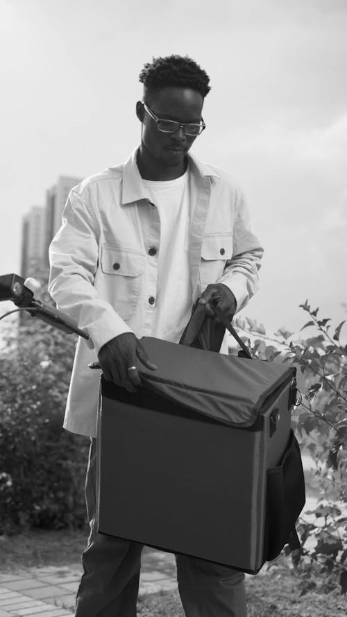 Man Opening a Thermal Bag