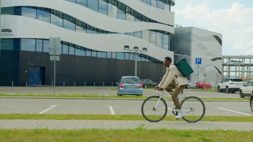 A Delivery Man rRding his Bicycle