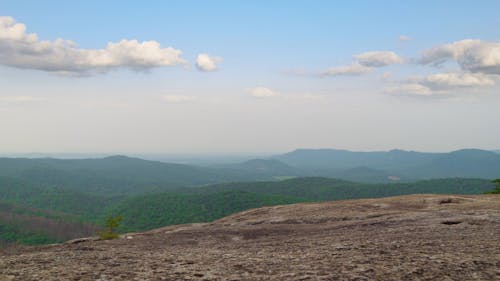 A Man Walking on the Mountain