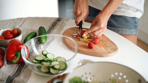 Close Up Video of a Person Slicing Radish