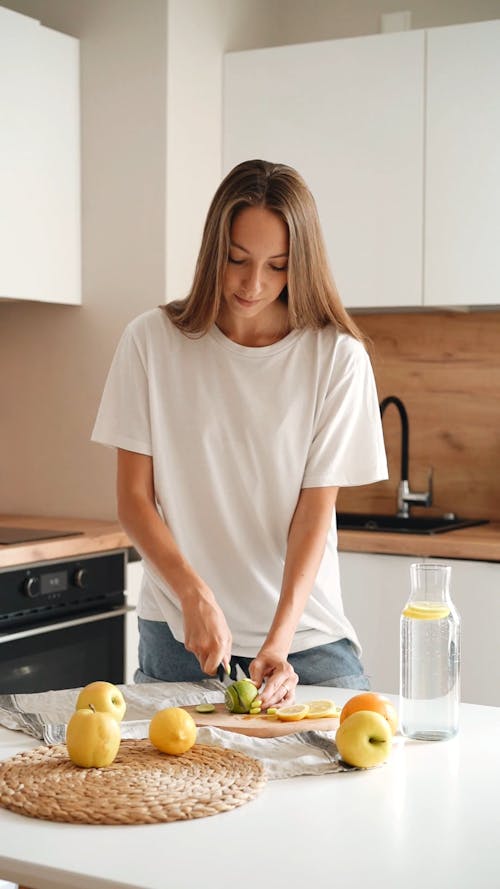 A Woman Slicing a Lime