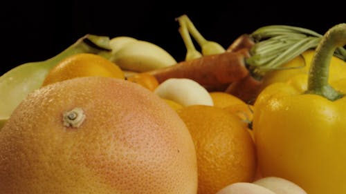 Push in Shot of a Variety of Fruits and Vegetables