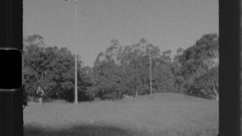 Vintage Video of a Person Running on a Field