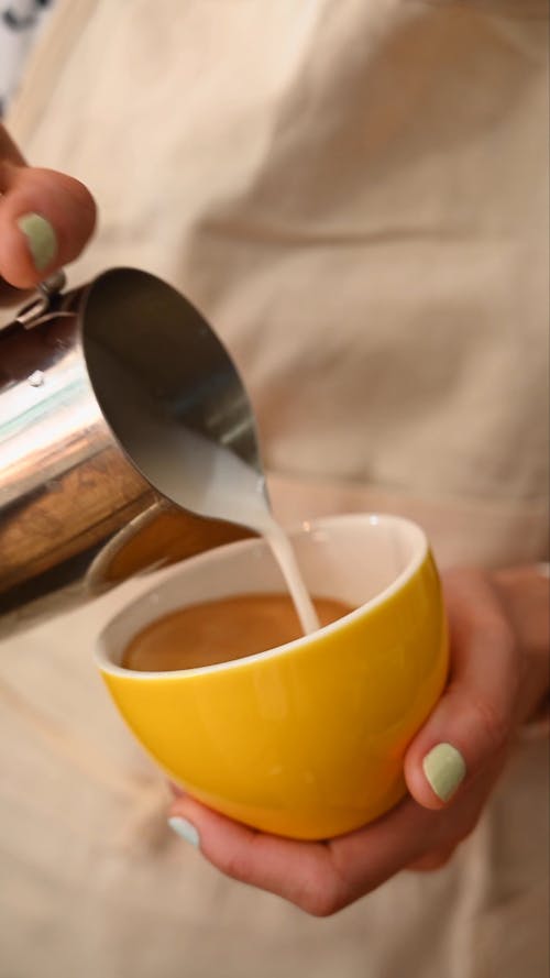 A Barista Making Latte Art