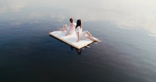 Women Sitting on the Raft
