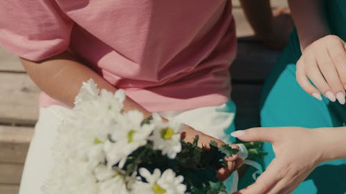 Man Giving Flowers to a Woman