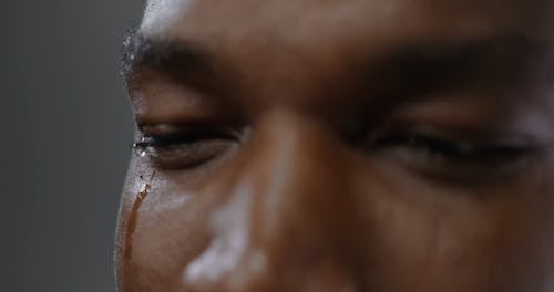 A Close-Up Video of a Man Crying