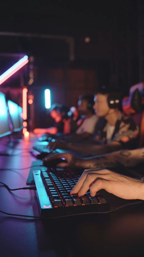 Close-Up Video of a Person Typing on Keyboard while Clicking the Mouse